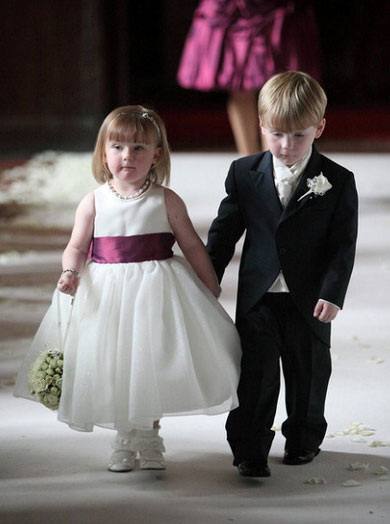 Page Boy and Flower Girl Holding Hands
